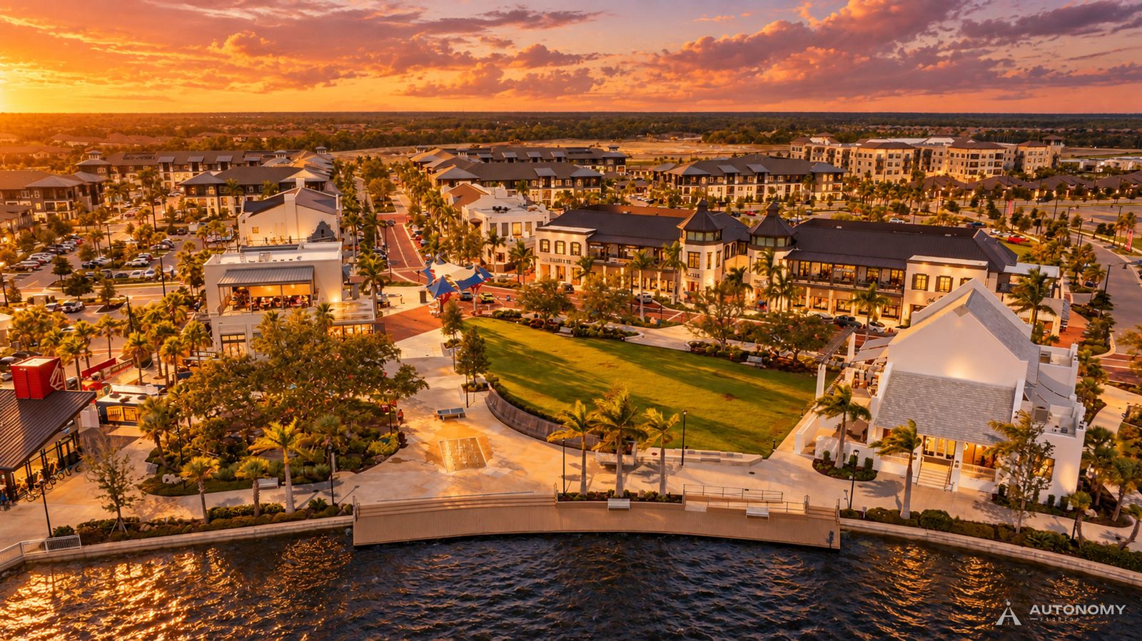 Aerial view of Downtown Wellen and the Grand Lake at sunset, Wellen Park, Venice FL